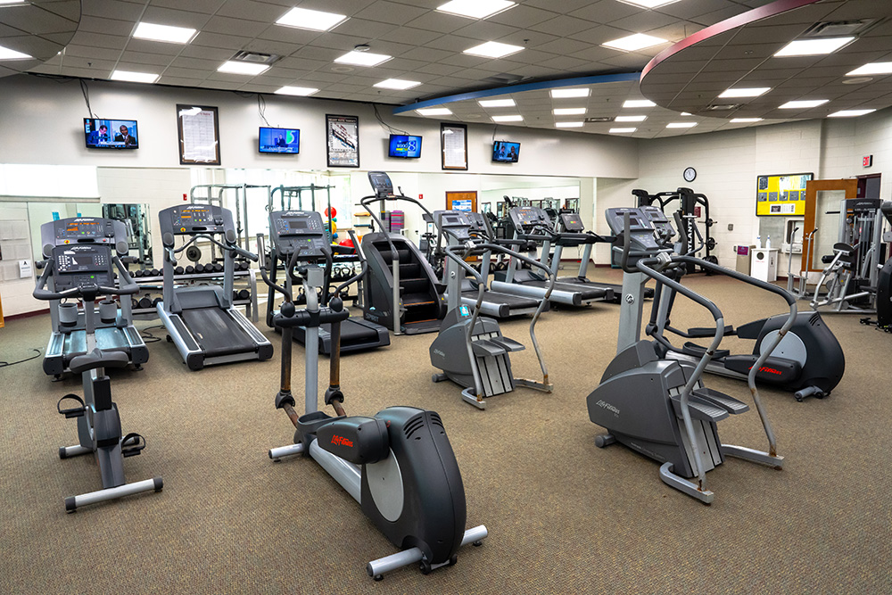 Room full of cardio equipment at the Stone Recreation Center on the Campus of Alma College.